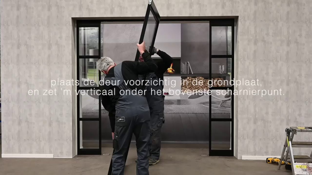 Montage impressie van de stalen taatsdeuren