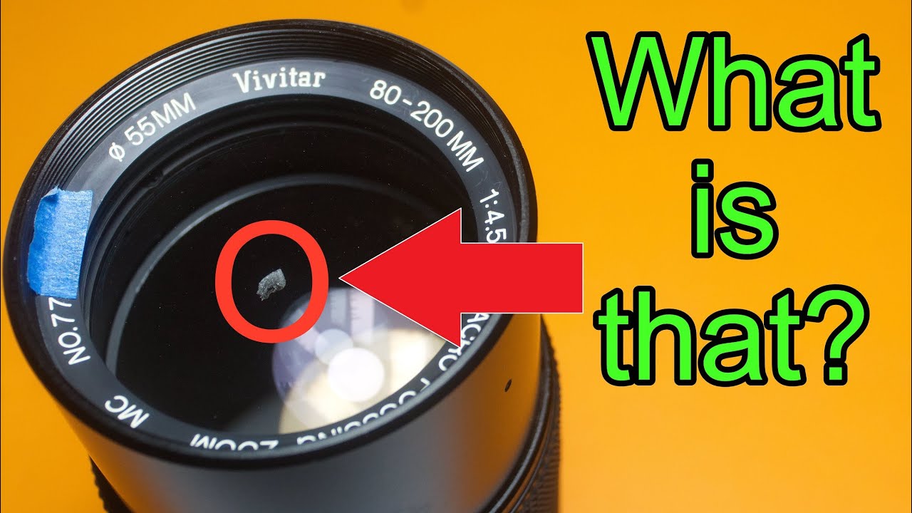 Removing debris from Vivitar 80-200mm F4.5 Zoom lens.