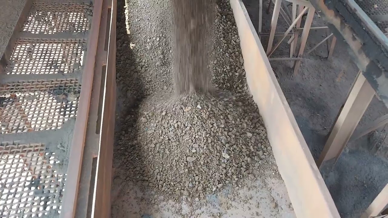 Iron ore lump loading in rail wagons with wagons moving