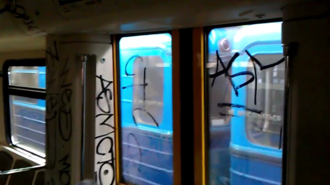 Removing graffiti from walls and glass on electric trains