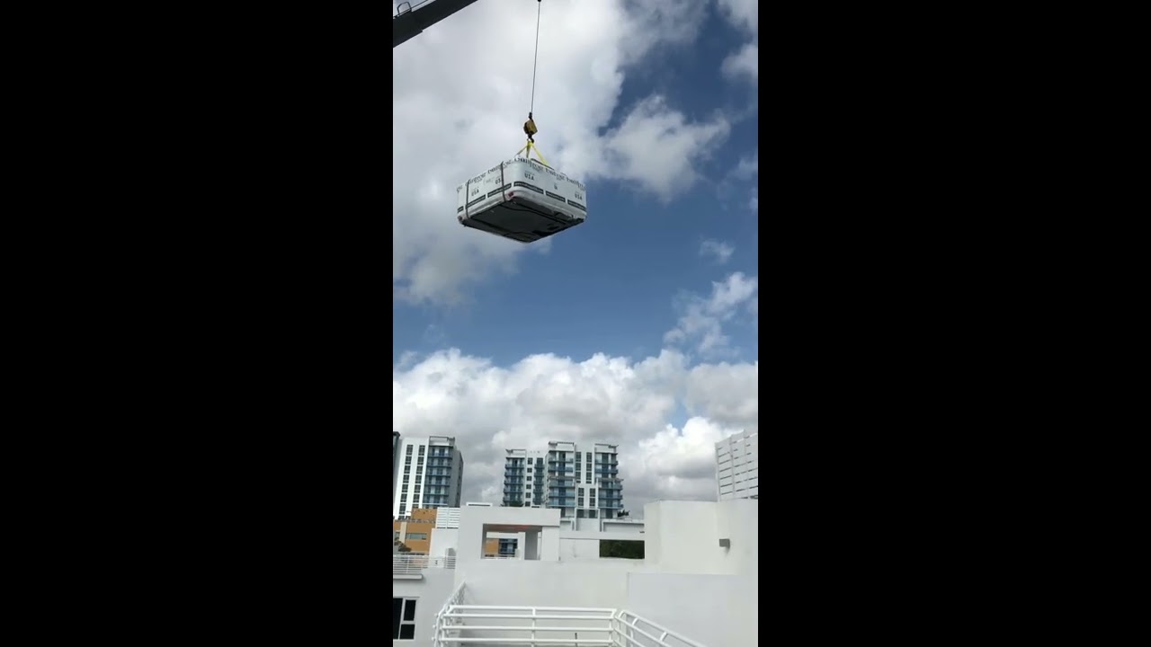 Harrison Crane & AFPC Lowers Hot Tub on to Miami Rooftop Terrace