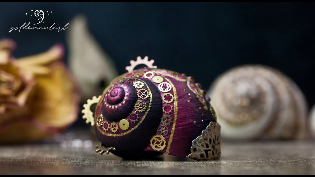 Pink Butterfly on painted Snailshell with Steampunk inspired prosthetics
