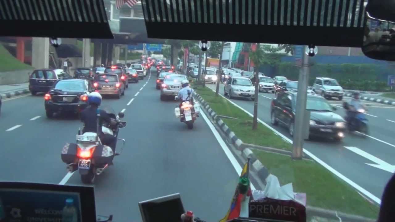To the Football Game with a Police Escort in Kuala Lumpur