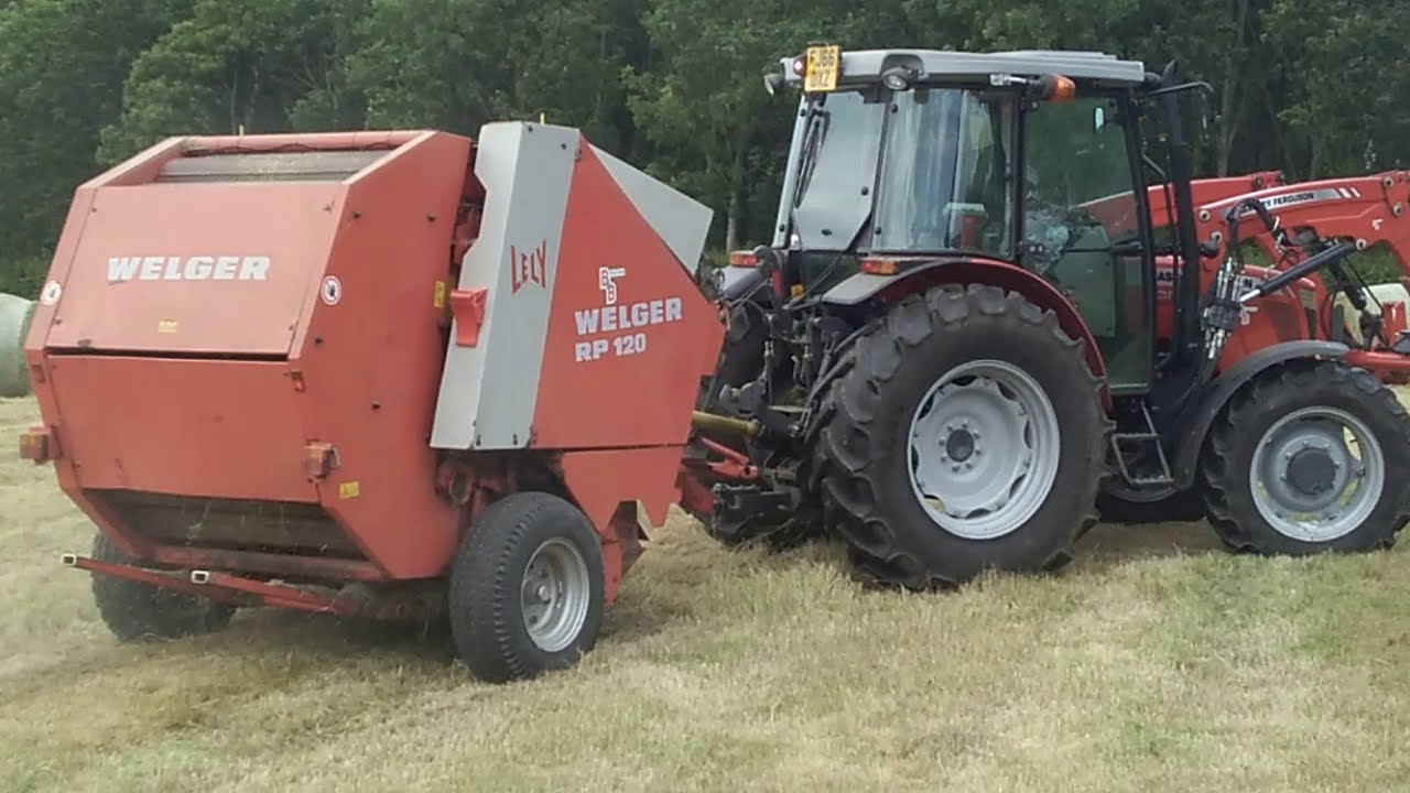Mf tractor and welger round baler