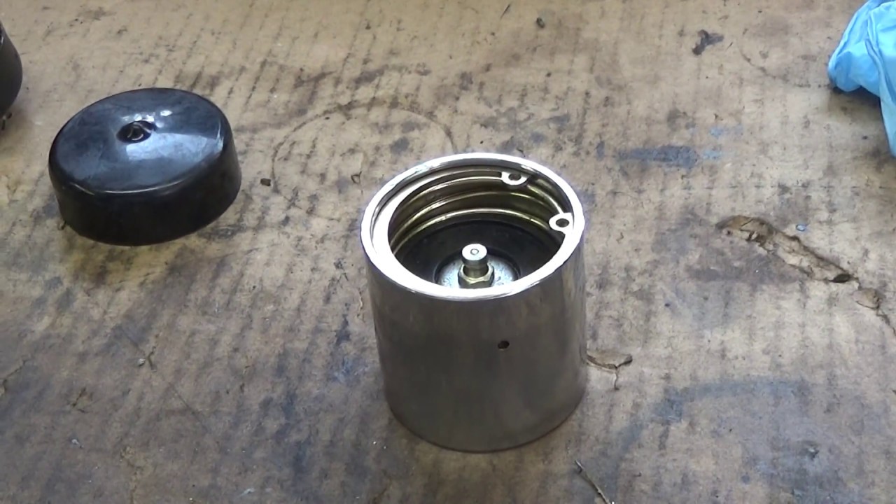 Bearing Buddy explanation & Greasable axle spindle