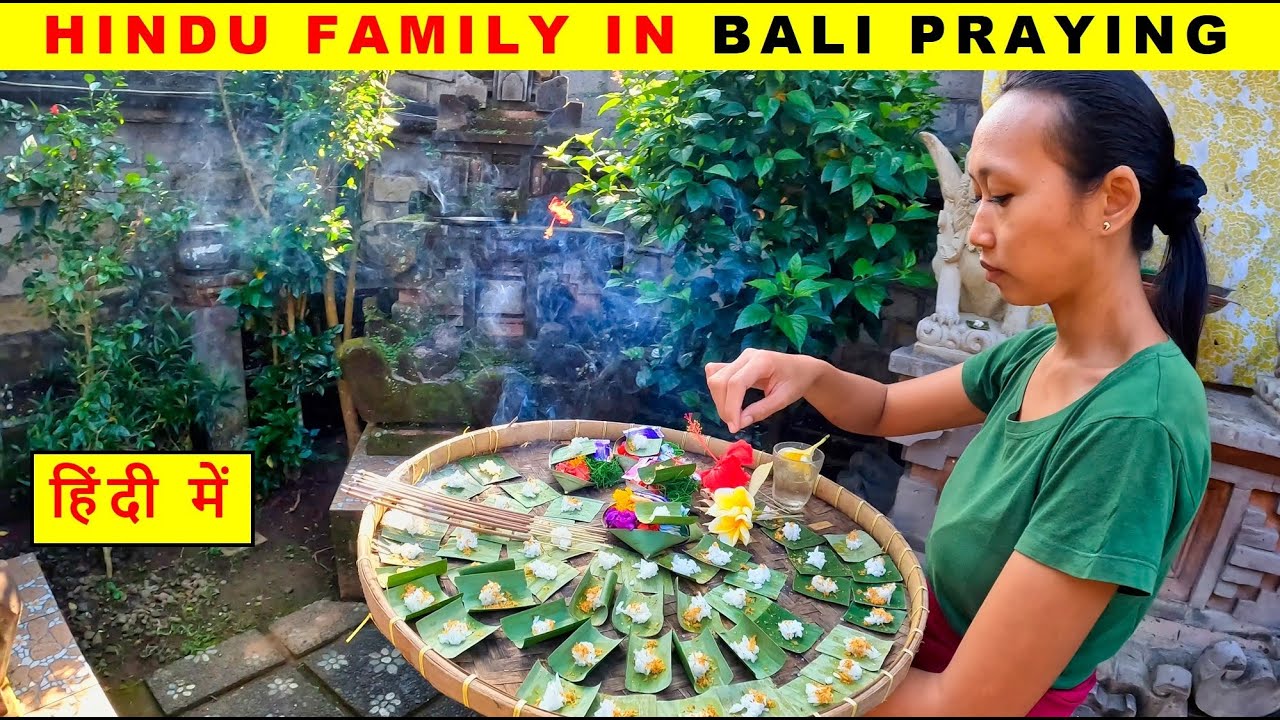 Hindu Family in Bali Indonesia Offering Family Prayer