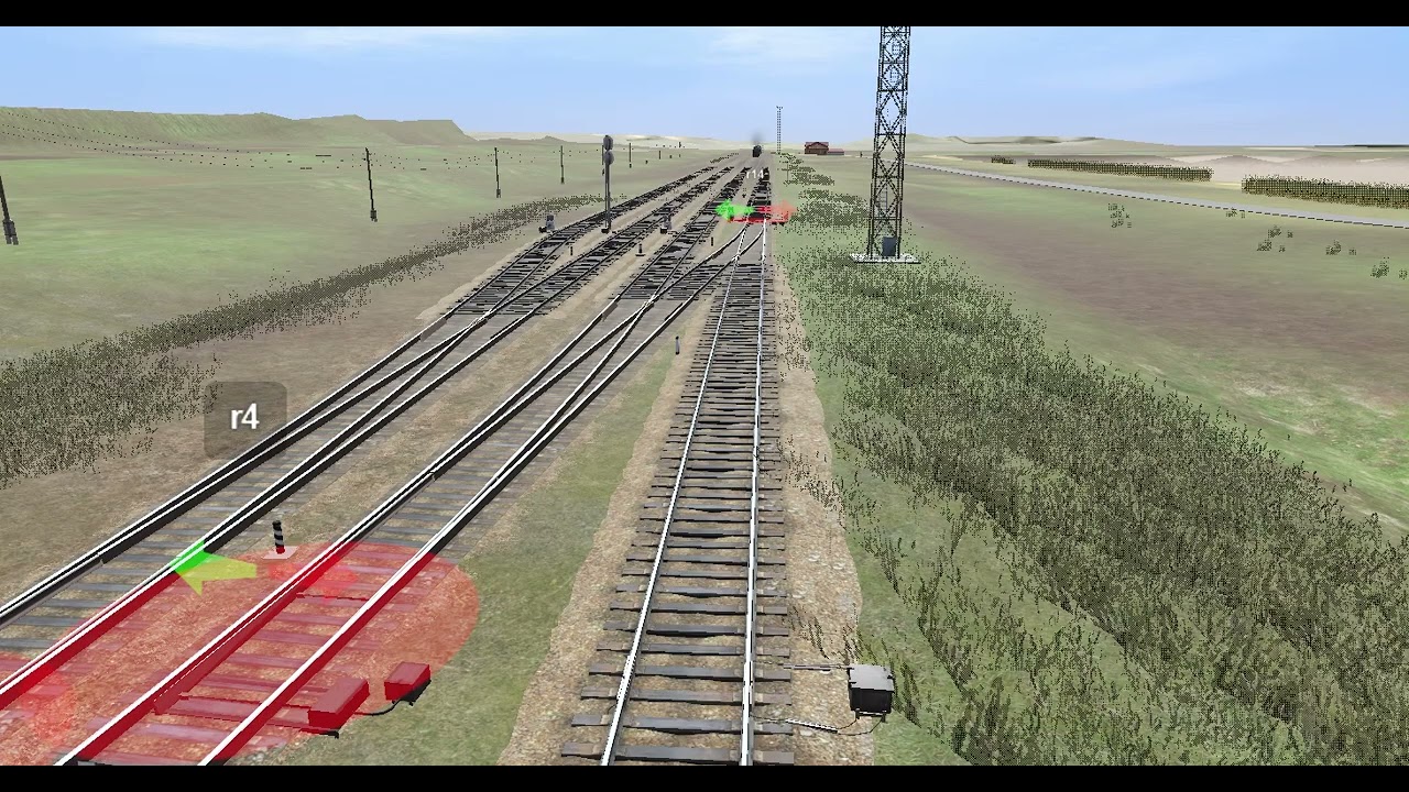 ТЭМ2У с небольшим грузовым составом проезжает стрелку.