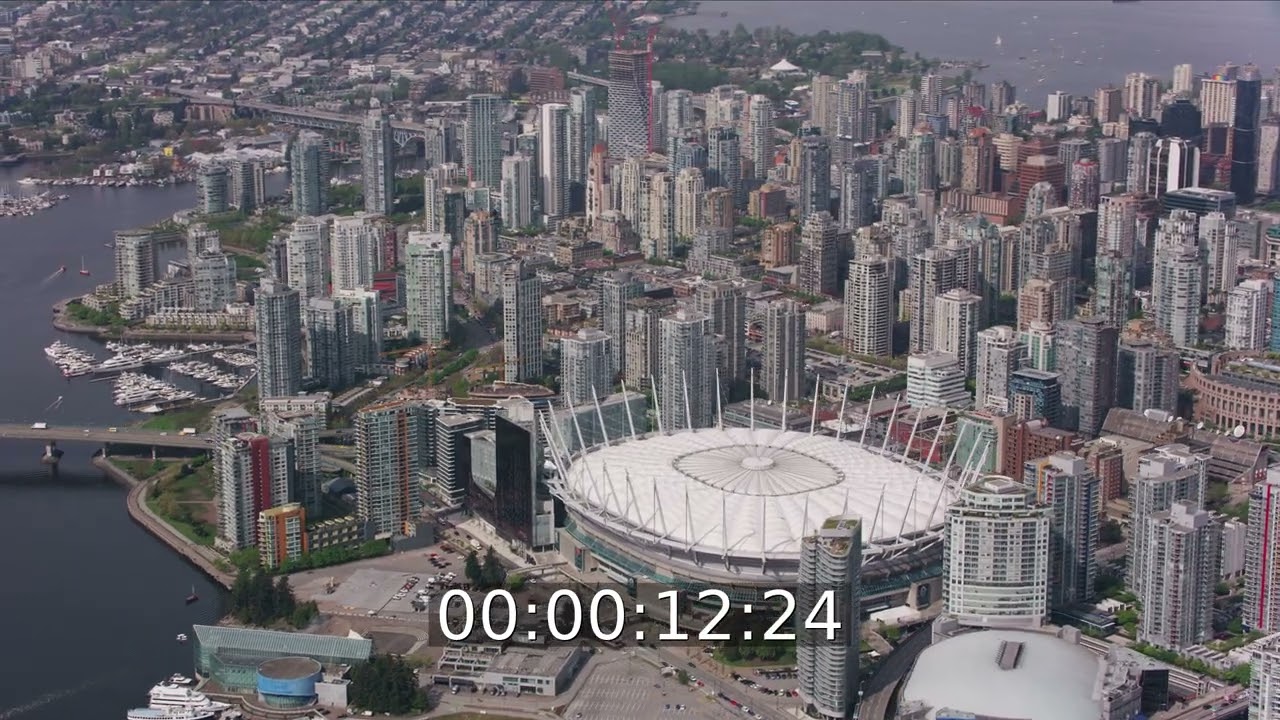 "BC Place Stadium" on Expo Boulevard in front of the skyline in Vancouver, British Columbia, Canada
