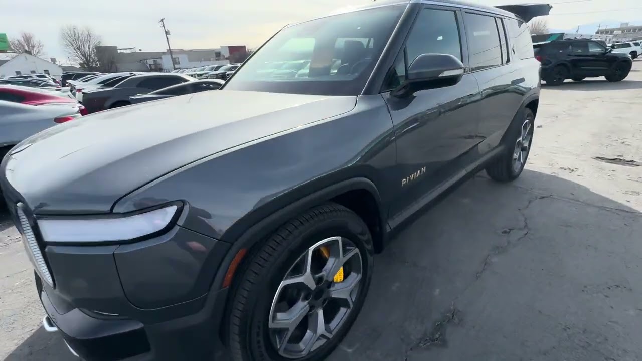 Grey rivian r1s adventure quad large 