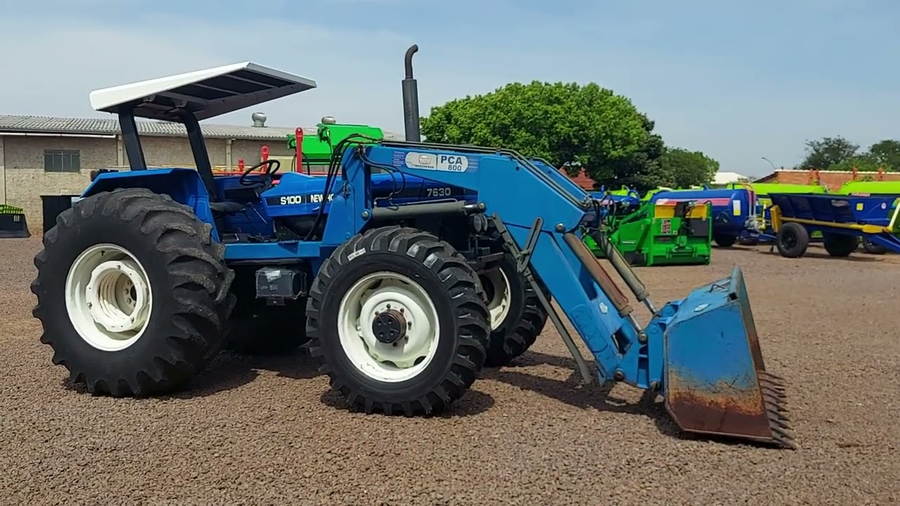 Trator New Holland 7630 ano 2002 com plaina - ROHR MÁQUINAS