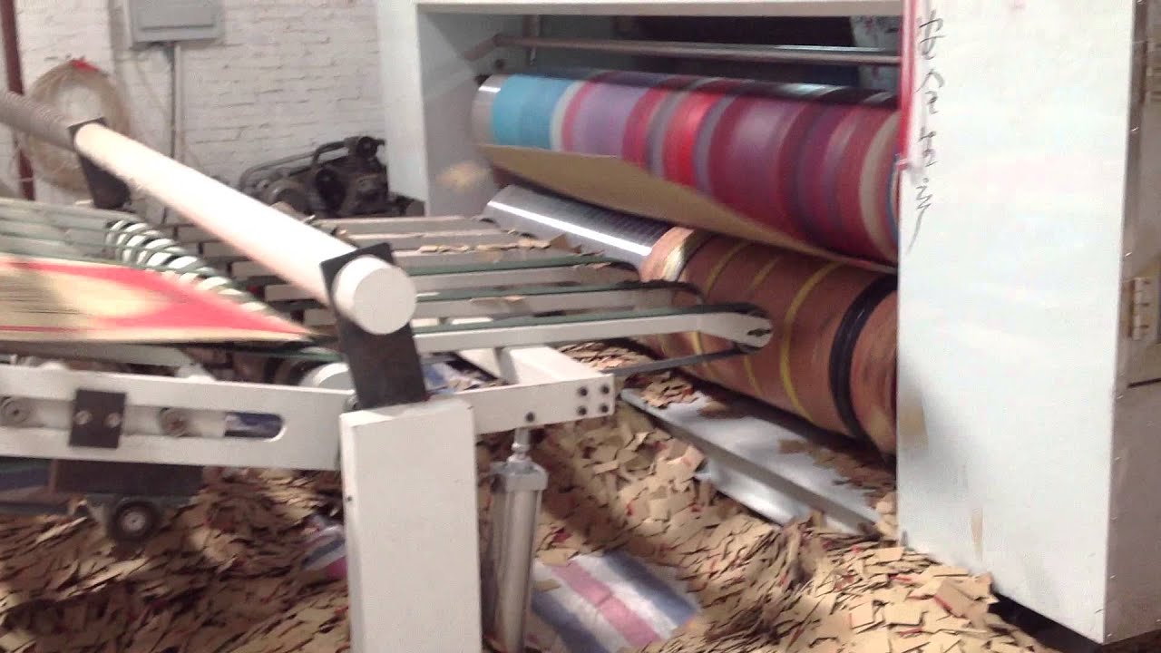 PL-Y2 Chain Feed Flexo Print Die Cutting Machine With Stacker And Package--2014-9-6--PinLong Seiko
