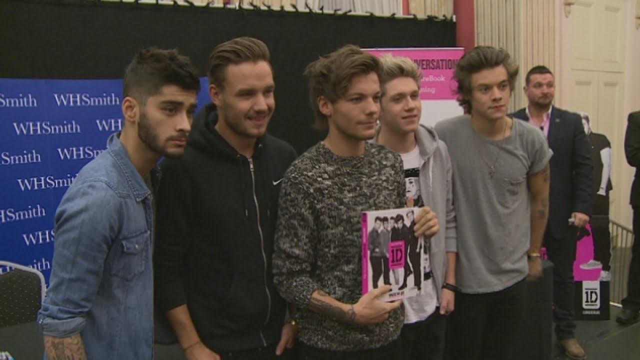 EXCLUSIVE One Direction footage: 1D meet and greet fans at top secret book signing