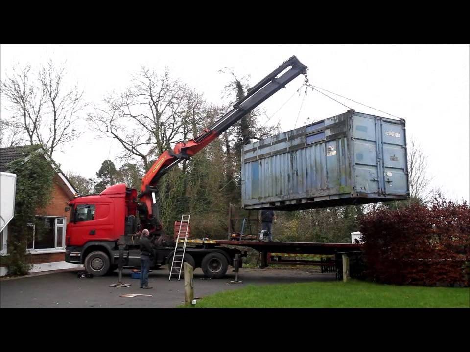 Loading 20 foot container from outside our house.