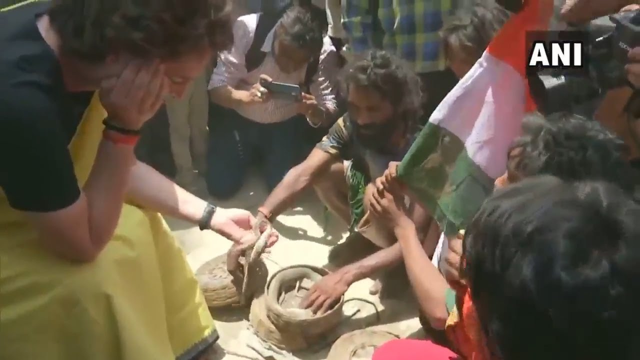 Priyanka Gandhi holds snakes in her hands while campaigning in Raebareli