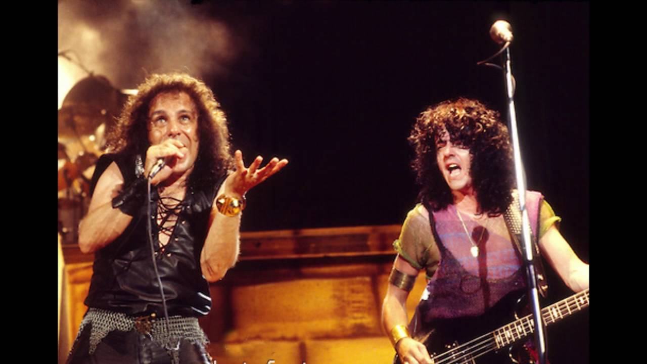 DIO CAUGHT IN THE MIDDLE LYRICS Y TRADUCCI&Oacute;N