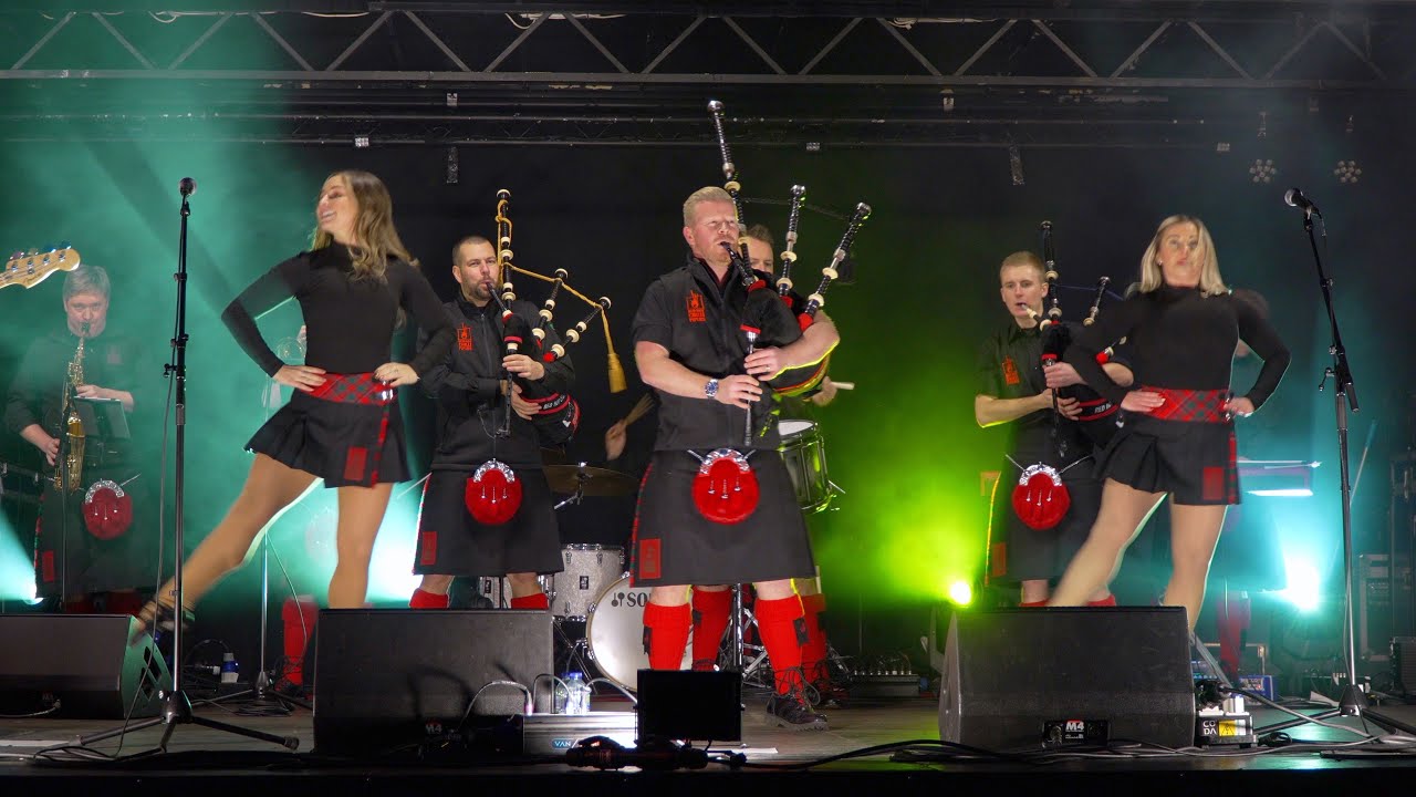 Red Hot Chilli Pipers joined on stage by Chilli Dancers for Perth's 2022 St Andrews Day Celebrations