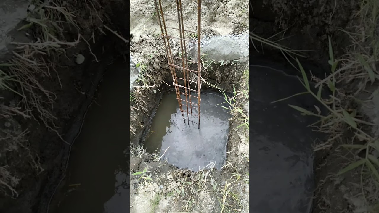 Enchimento de sapata alagadas com concreto seco.