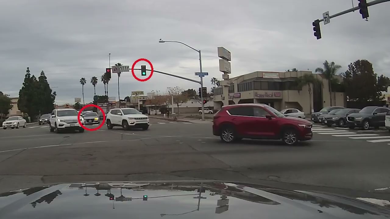 Honda Runs Red Light in Front of Police (Instant Karma)