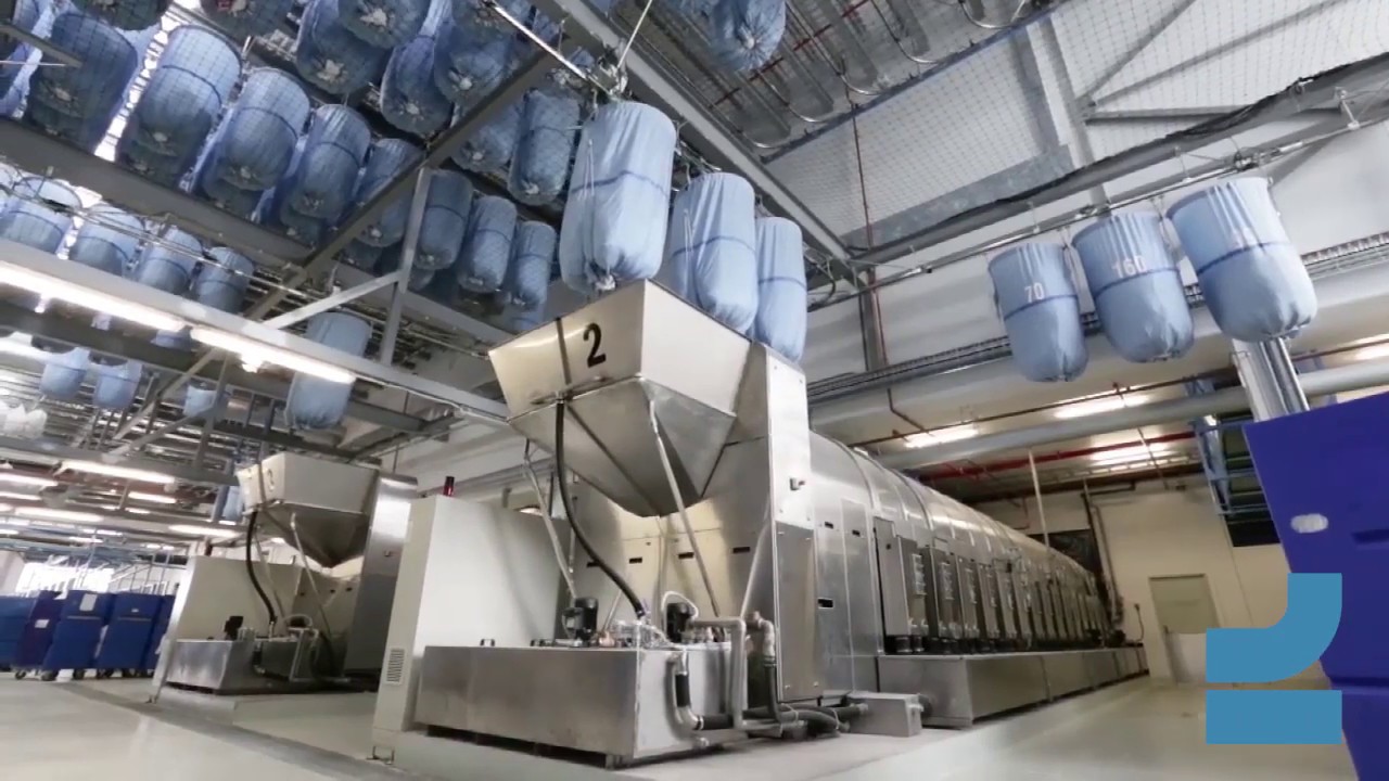 Dunnewolt overhead conveyor for for industrial laundries - Holy Cross Laundry