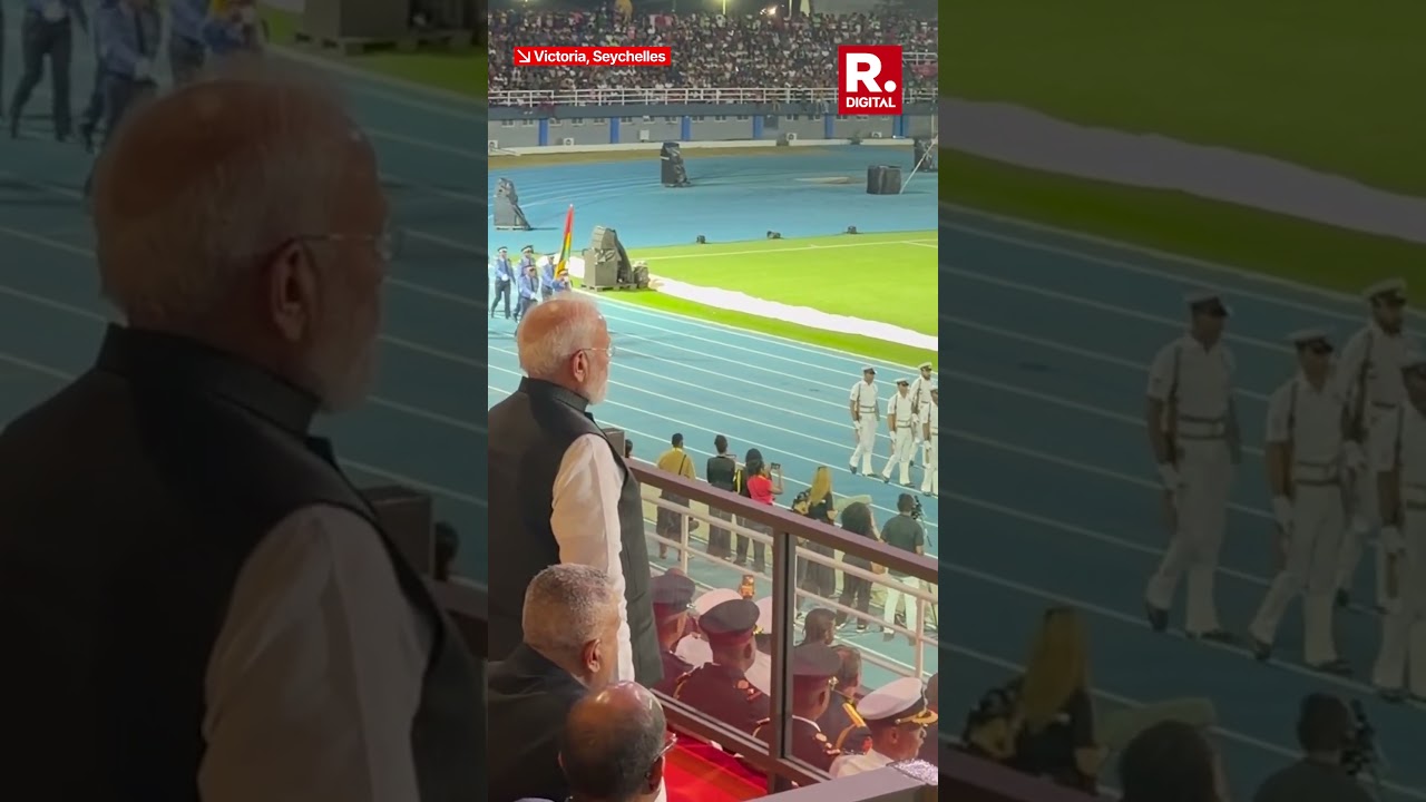 PM Modi Stands Up As Indian Armed Forces Contingent Marches In Seychelles
