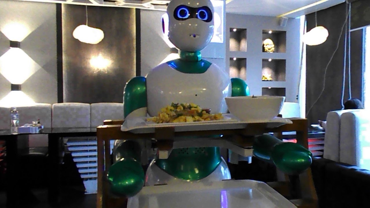 Naulo Restaurant with robot waiter in Kathmandu, Nepal. Robot is bringing food.