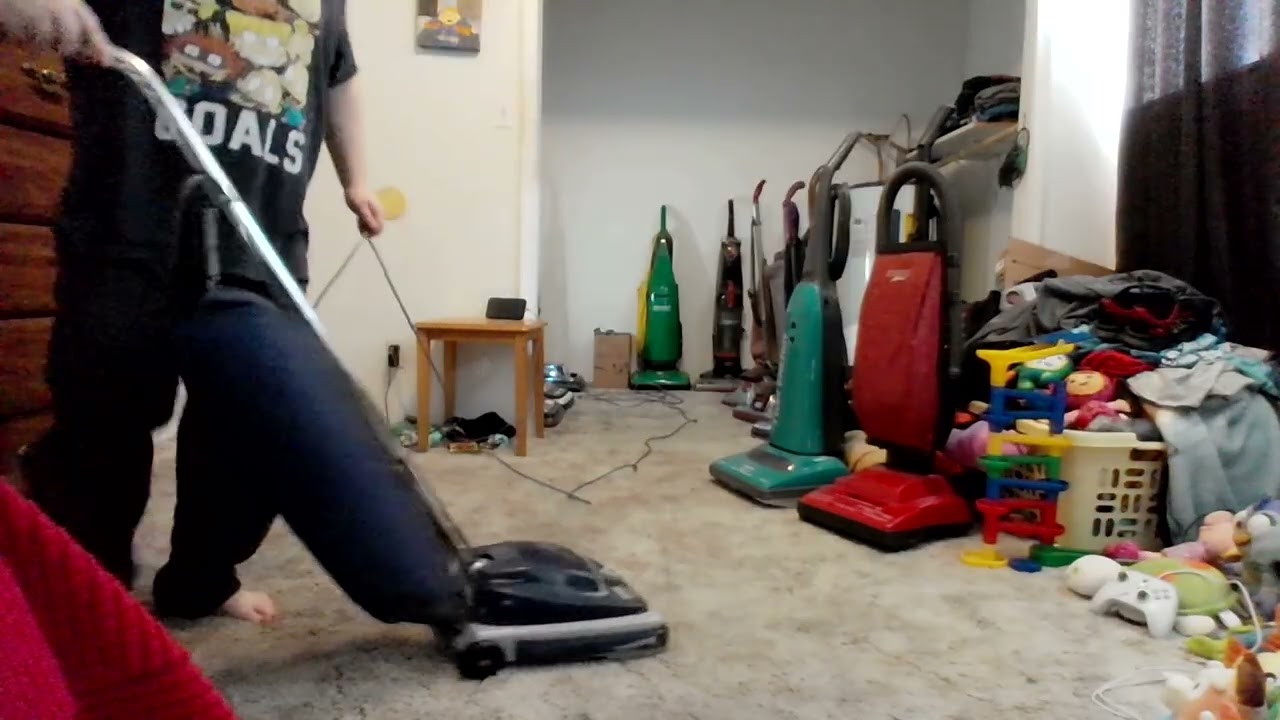 vacuuming the bedroom with 2008 sanitaire s647 type e