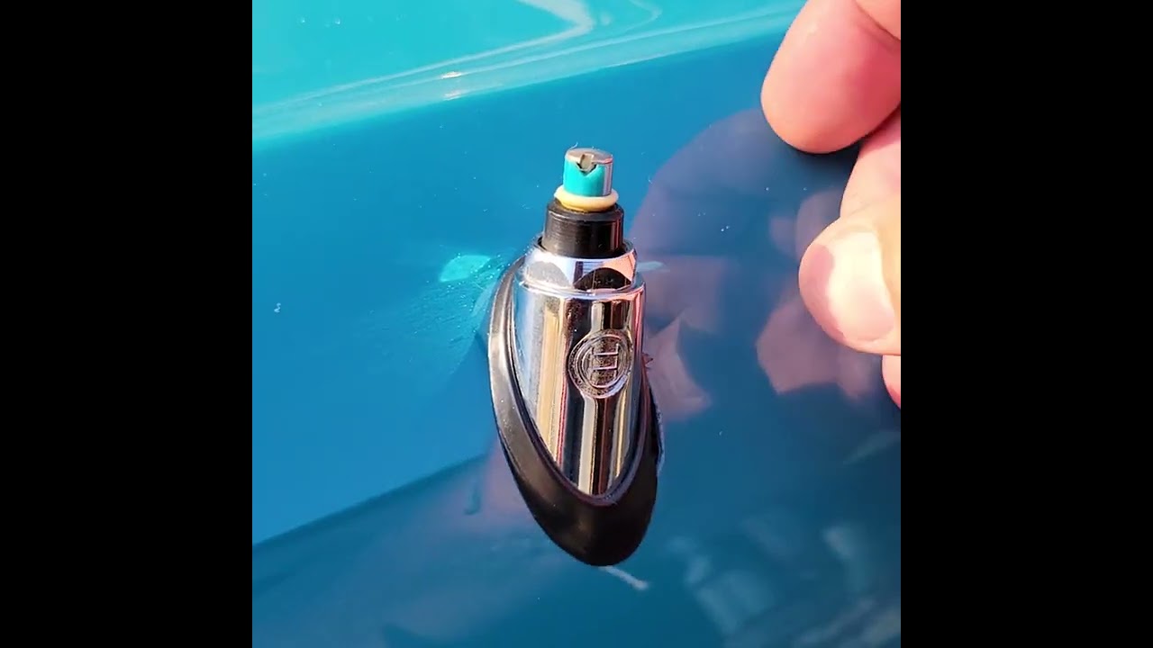 Touching a Sea Blue 1962 VW Type 34 Karmann Ghia Coupe