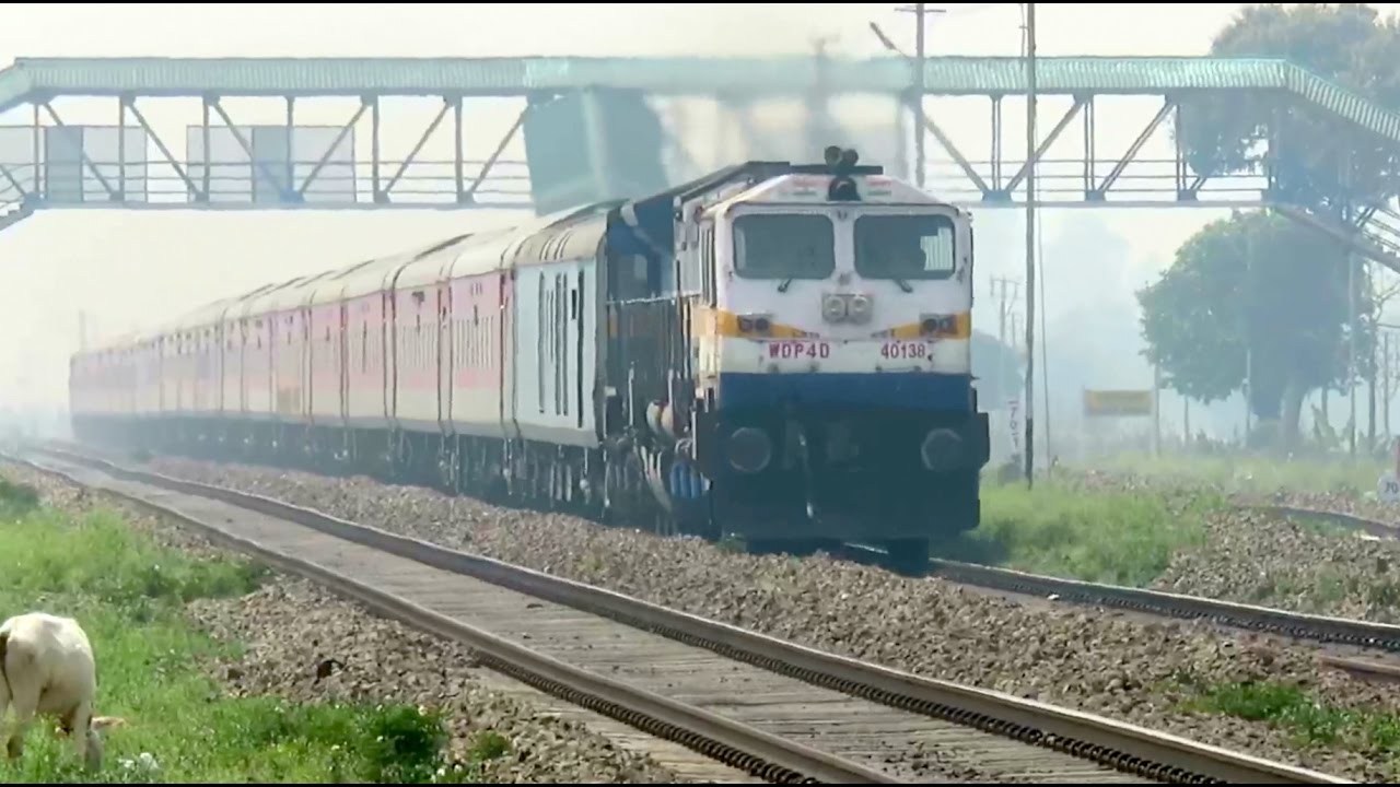 Glorious NFR : 120 KMPH : Dibrugarh Rajdhani Express with SGUJ WDP4D Knocks Gaisal : Indian Railways