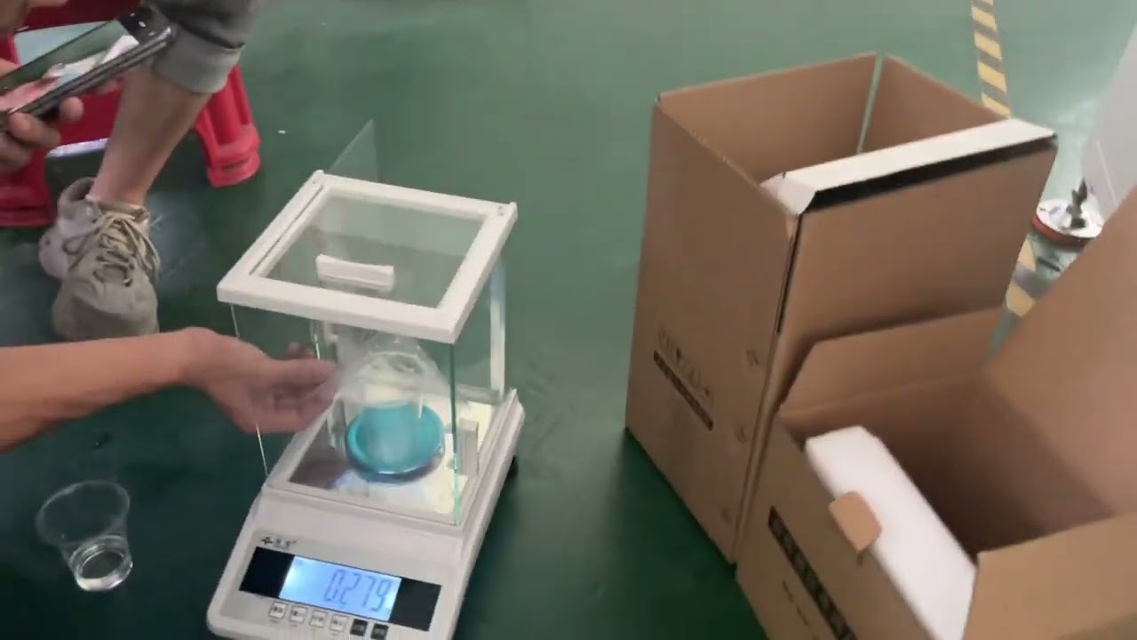 Single component 0.1 gram per shot glue dispensing machine