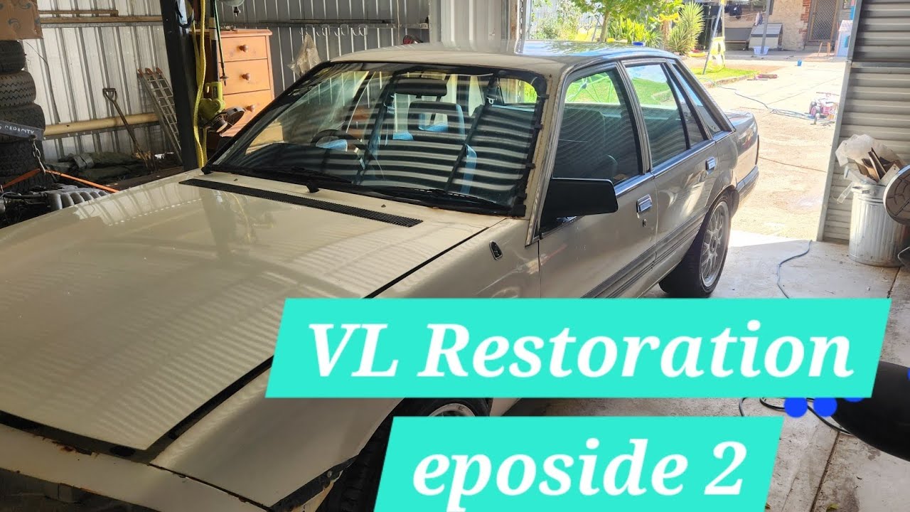 Holden VL Commodore Restoration E2 windscreen removal, doors pulled apart