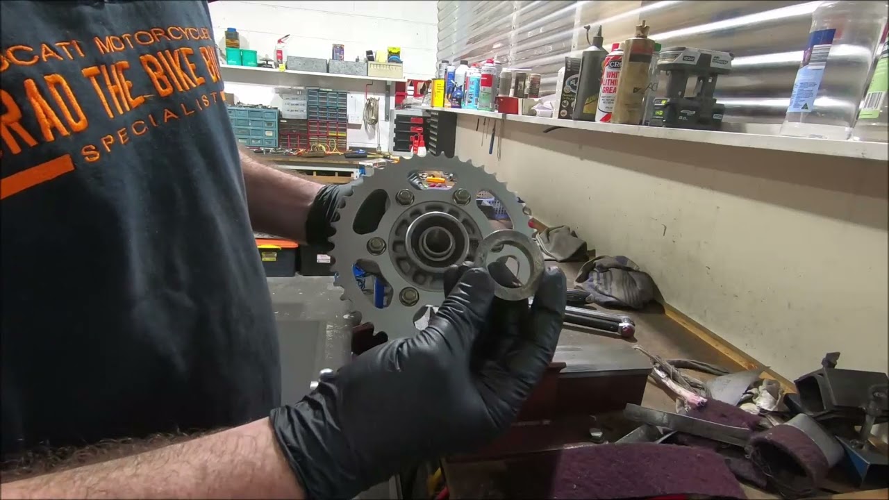 Ducati rear axle spacer orientation - the conical one on the LH side on dual sided swingarm models.