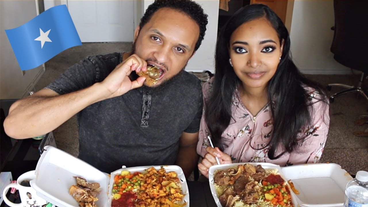 Sudanese & Ethiopian try Somali Food for the First Time Mukbang | Amena and Elias