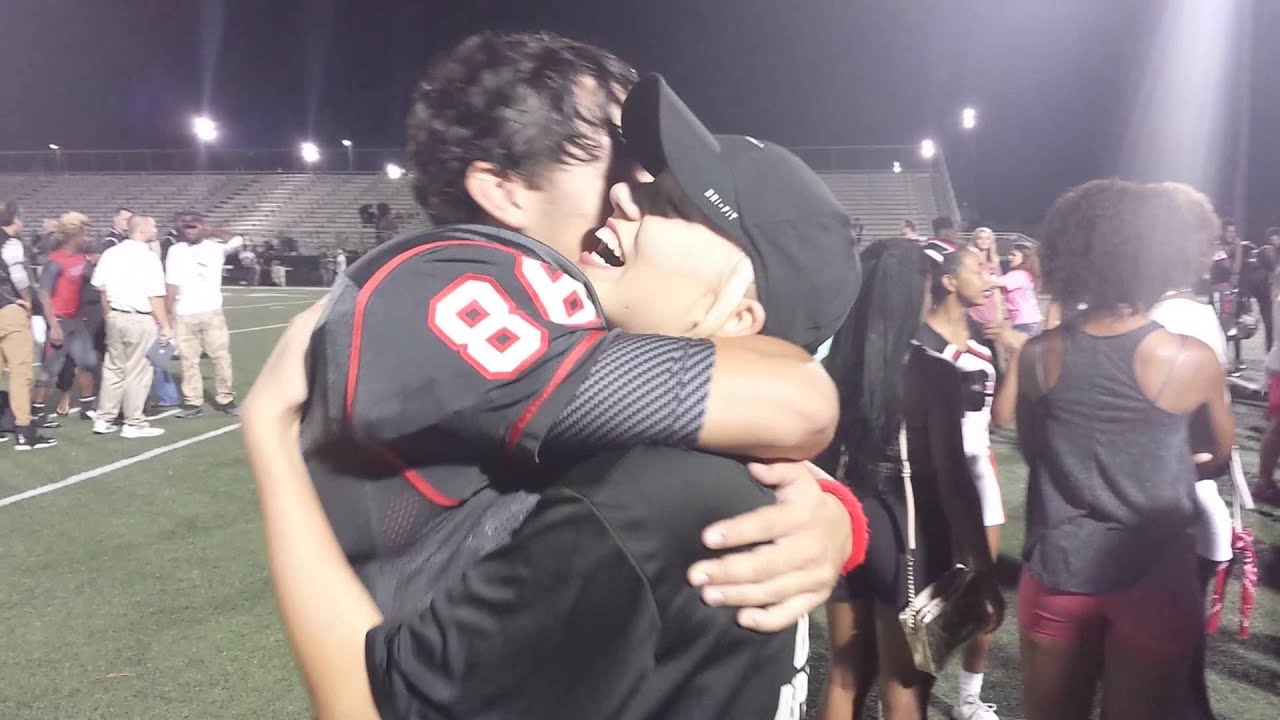 Girl surprises boy at football game!!!
