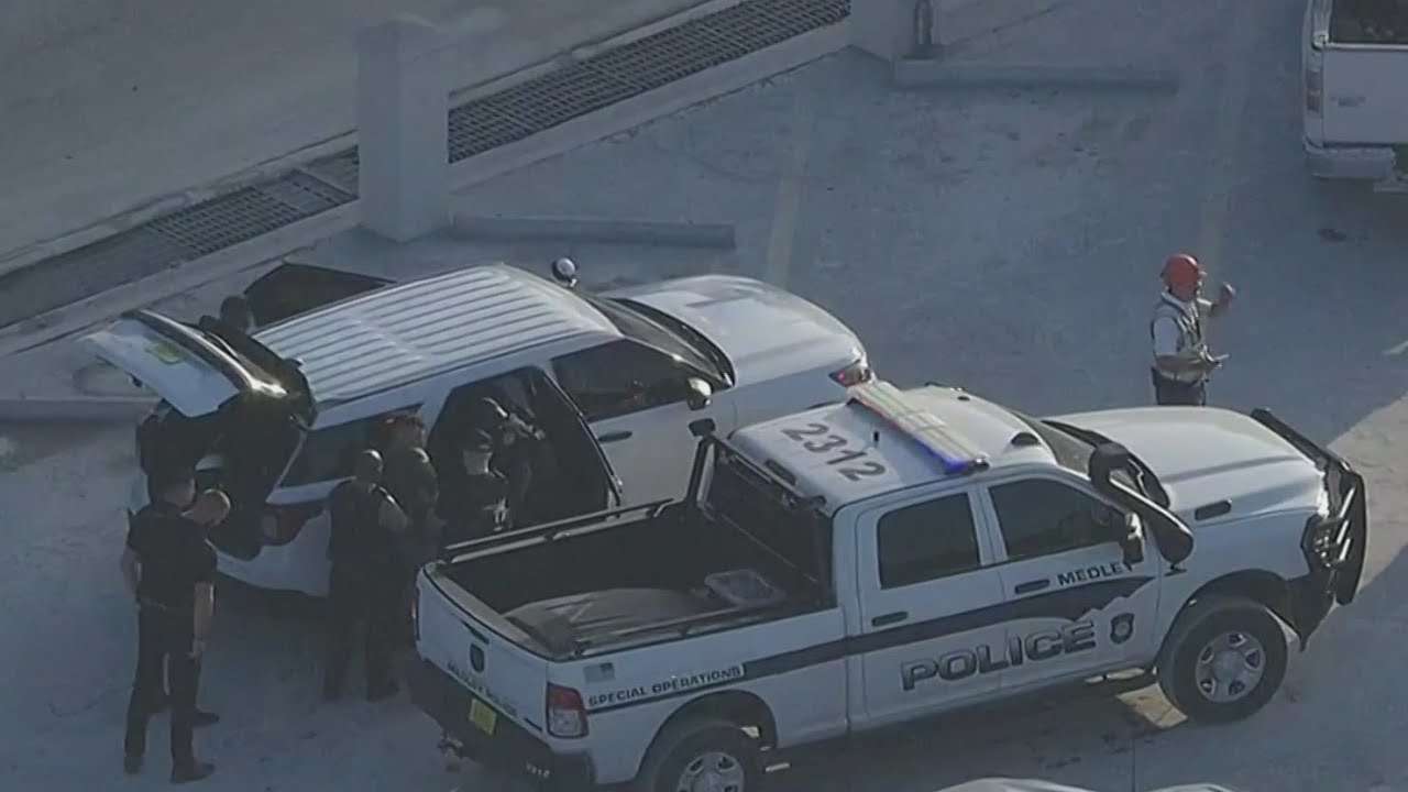 Man arrested for attacking a woman inside his car after police pursuit ended in Medley