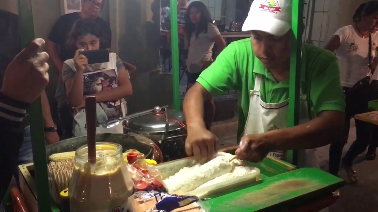 Elotes street vendor downtown Oaxaca Mexico.  May 2018