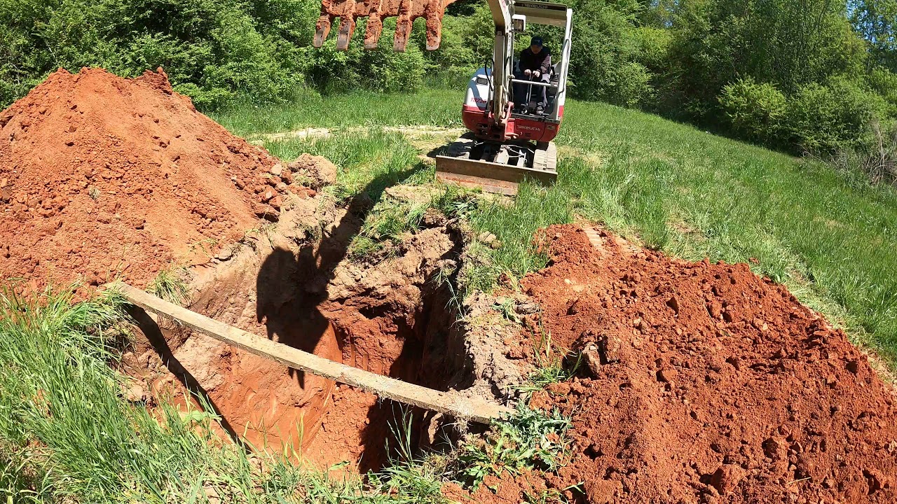 Digging Chicken Pit with the Takeuchi TB230