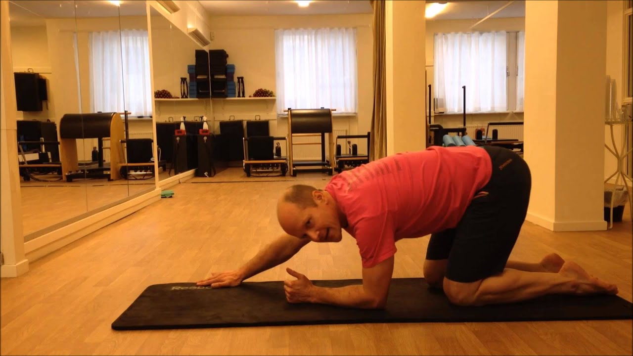 Advanced Pilates Swan Dive on the Mat