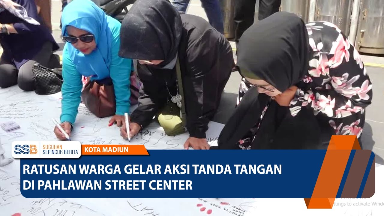 KOTA MADIUN - Ratusan Warga Gelar Aksi Tanda Tangan di Pahlawan Street Center