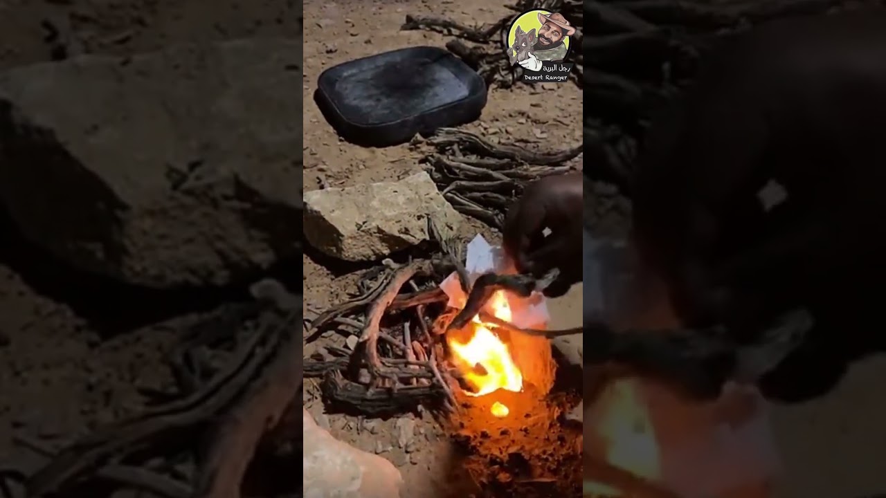 رجل البرية يشعل النار بطريقته الخاصة لطهي العشاء