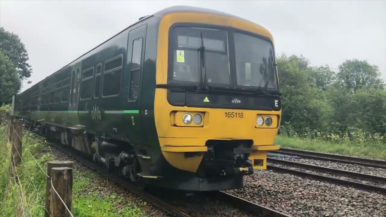 Trains at Bedwyn including its foot crossings and siding