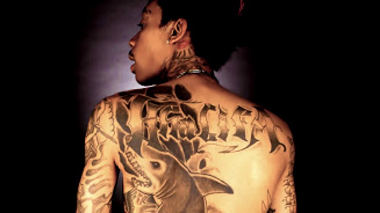 WIZ KHALIFA vs LIL WAYNE: Who Has The Most Tattoos?
