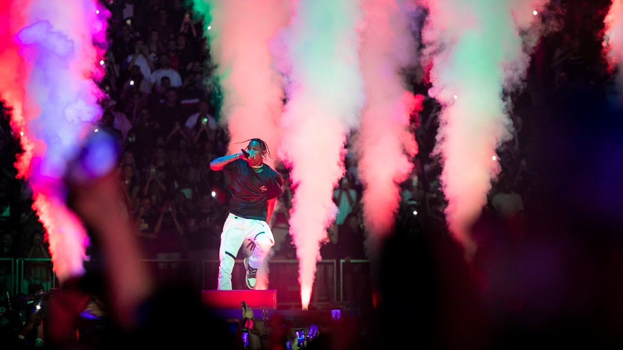 Travis Scott brings fan on stage during 