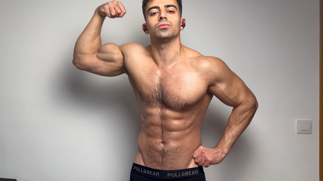 Flexing Muscles after Workout in the Gym