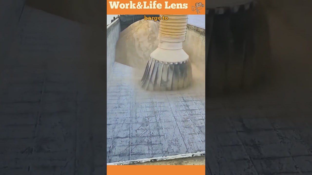 Sand loading onto a barge is controlled with a chute to reduce dust and contamination risks.