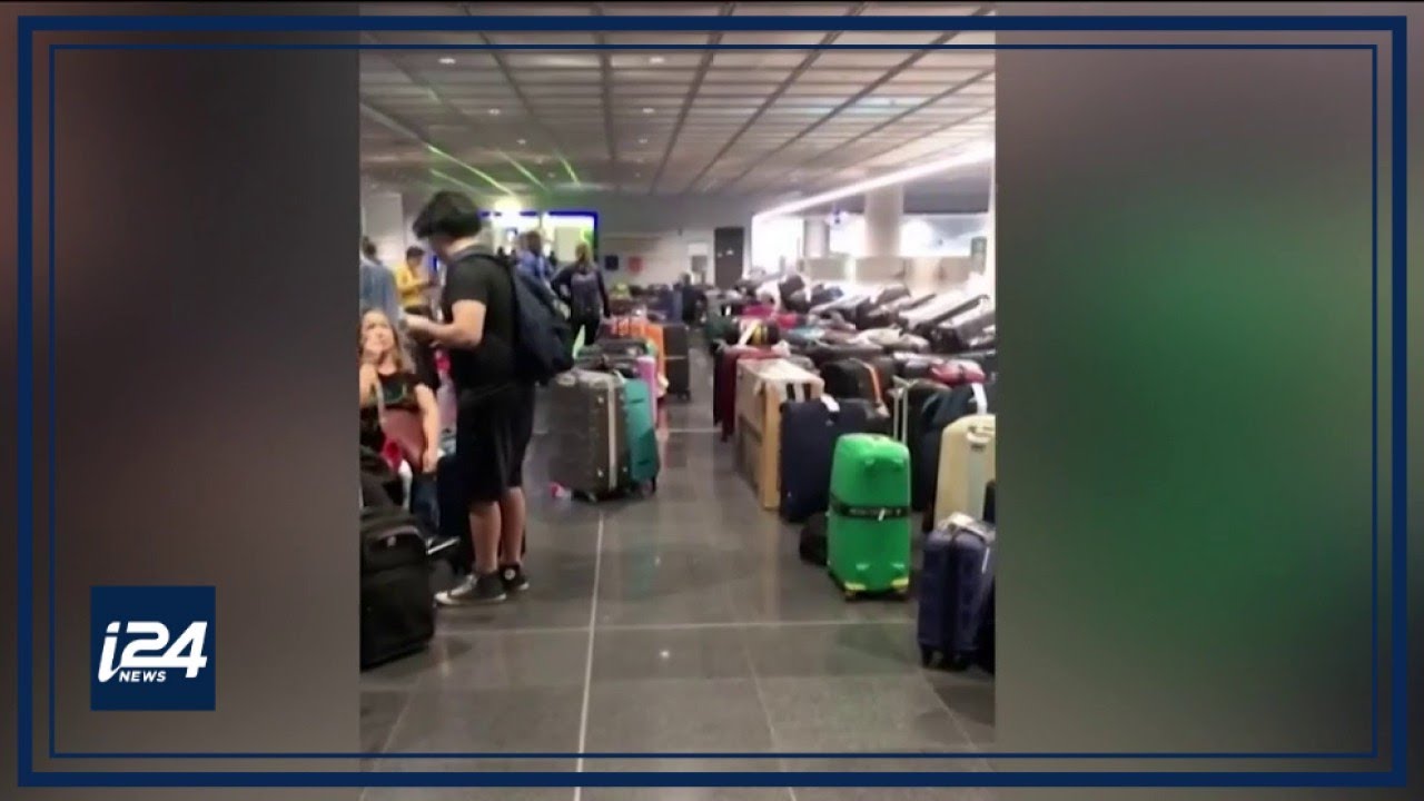 Travel runs into pandemic cutbacks with chaos at airports