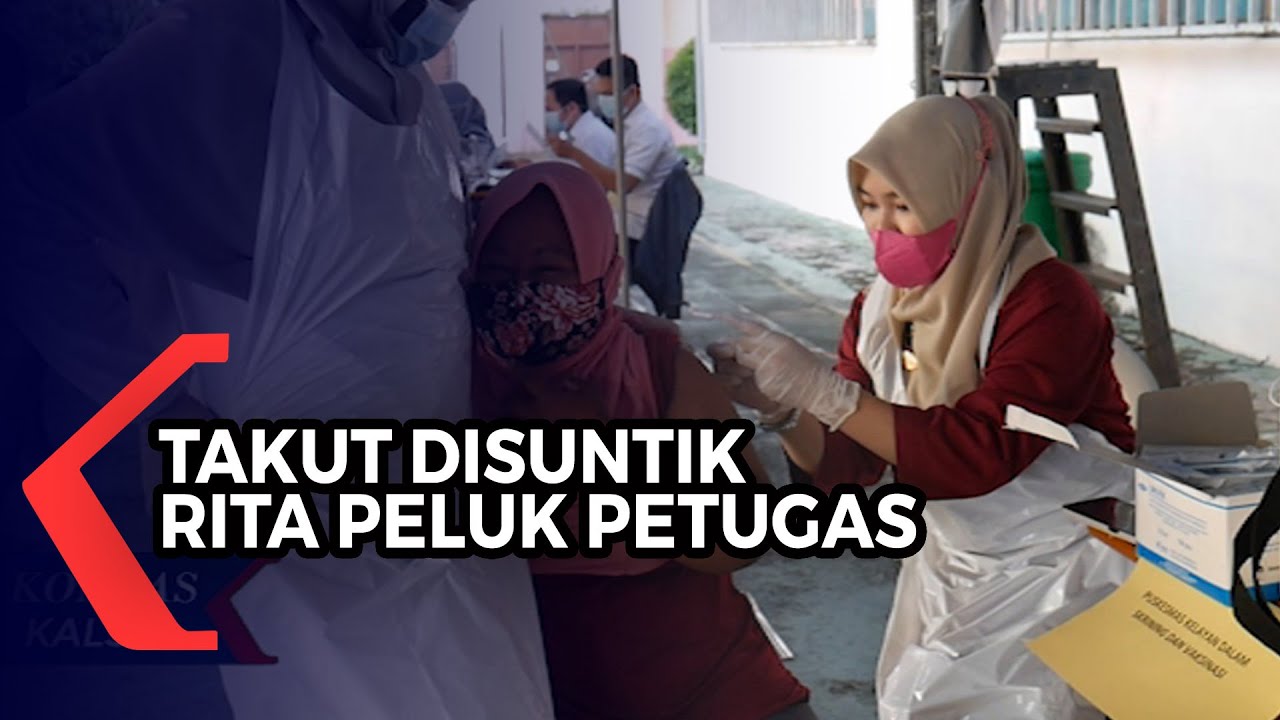 Takut Jarum Suntik, Seorang Wanita di Banjarmasin Peluk Petugas Saat Jalani Vaksinasi Covid-19