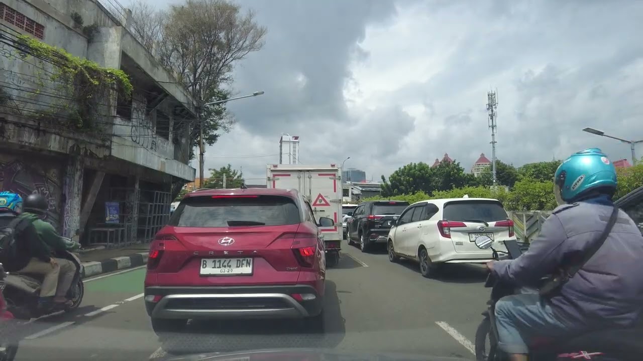 Drive Letjen Suprapto from Galur Central Jakarta towards The Railroad Crossing near Pasar Senen