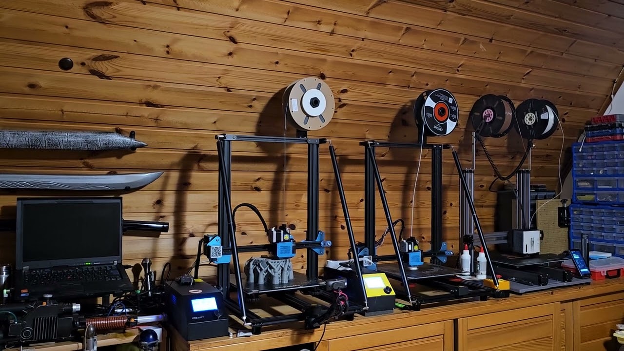 Three 3d printers running
