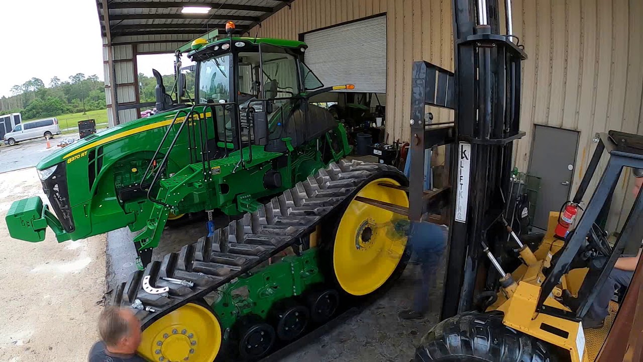 John Deere 8370RT track removal and drive wheel swap time lapse