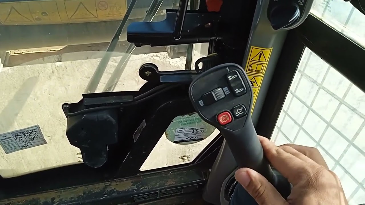 Como Operar Mini Carregadeira New Holland ( Bob Cat ) vídeo Aula